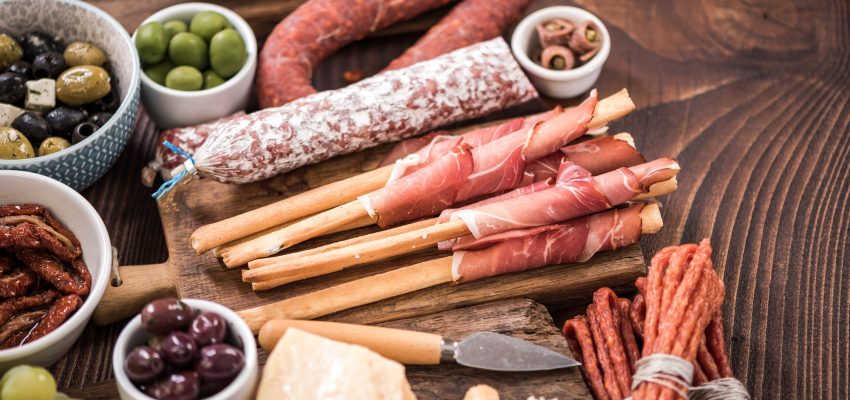 Spanish meat selection on wooden table